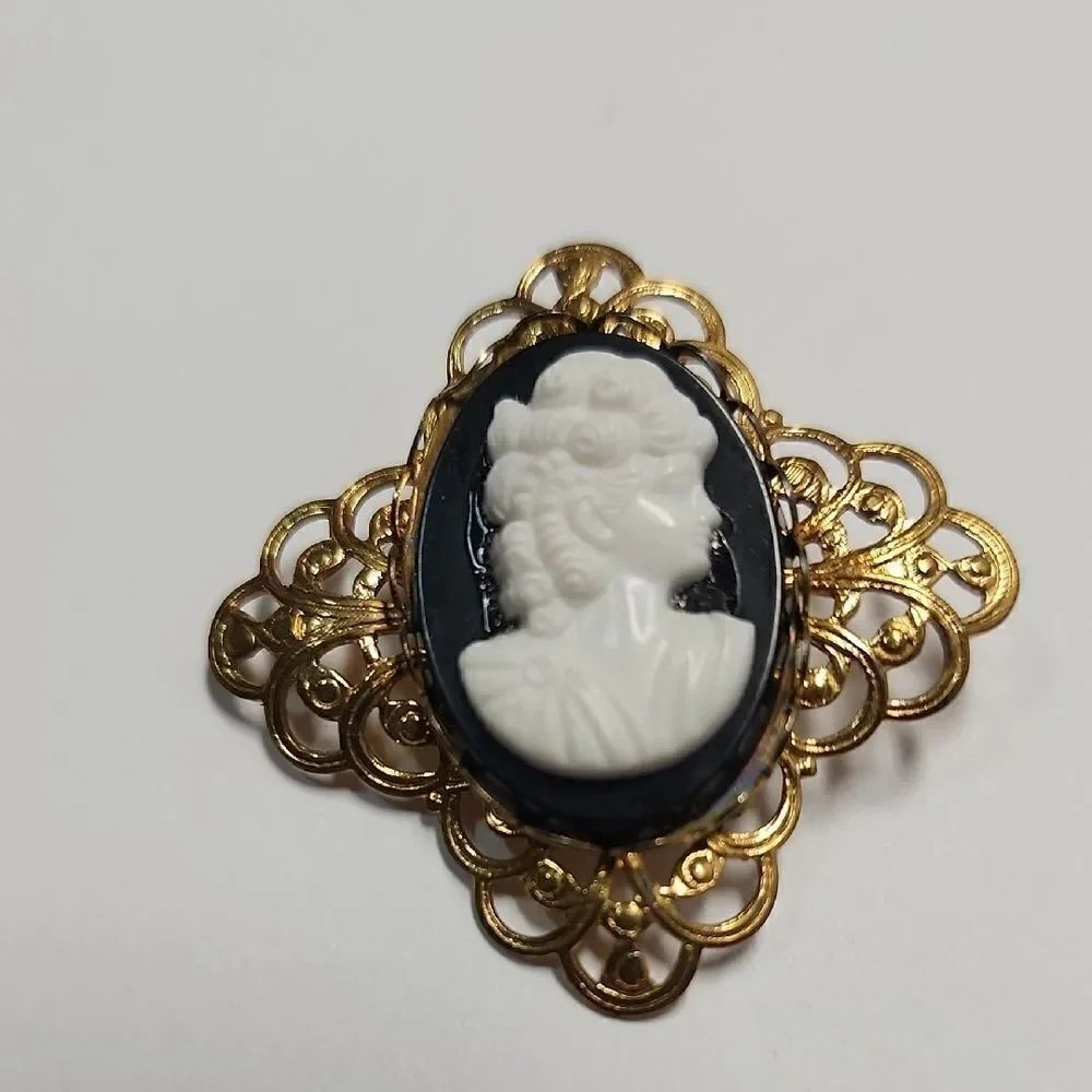 Elegant Gold and White Cameo Brooch